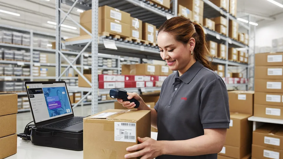 Pick-and-pack fulfillment station inside the CWG warehouse